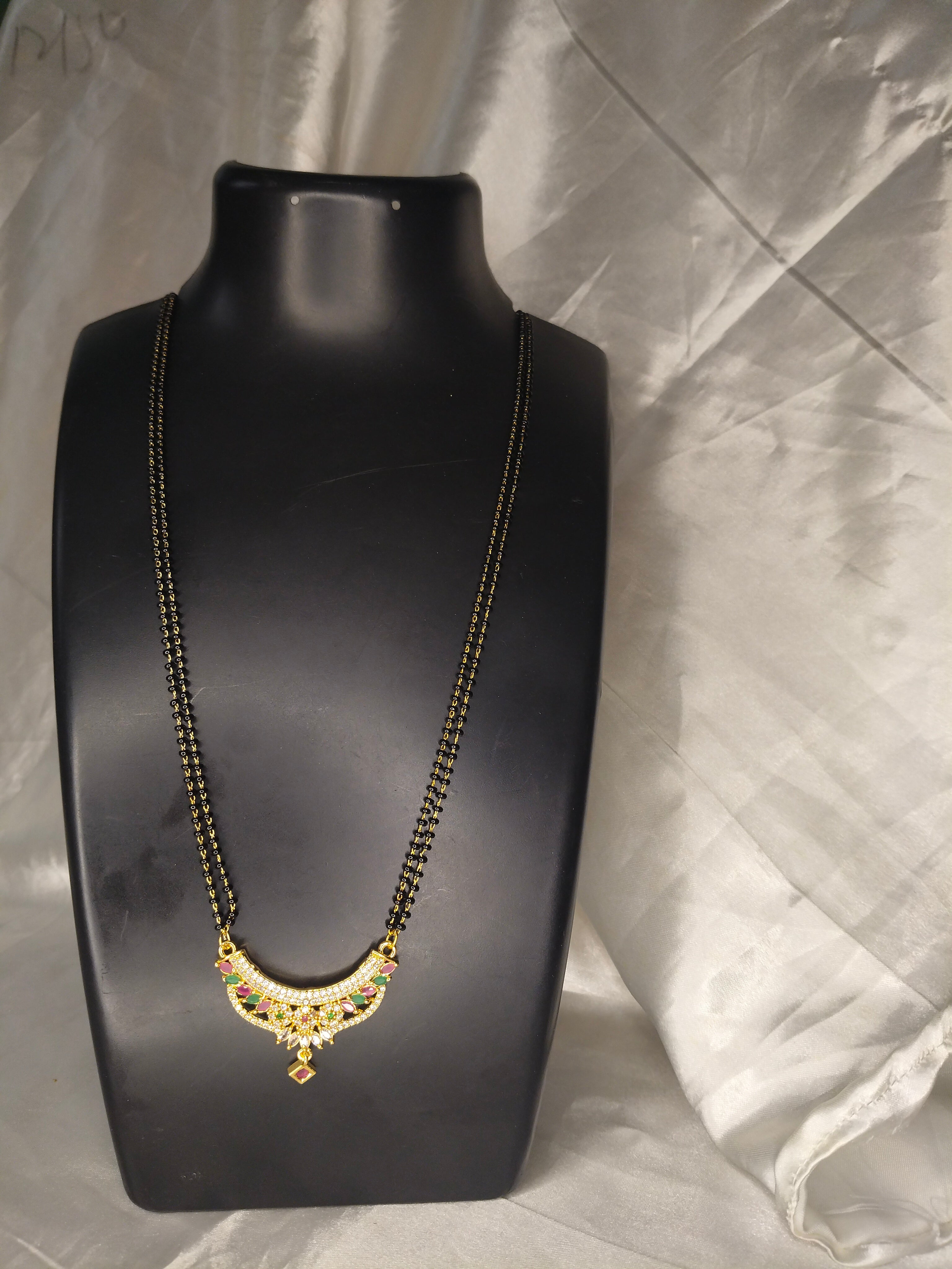 Black beads (nallapusalu) long with pendant