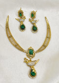 Short necklace set with small bird locket.